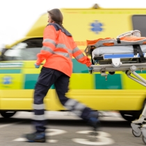 running paramedic with stretcher